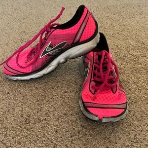 Pink Brooks running shoe